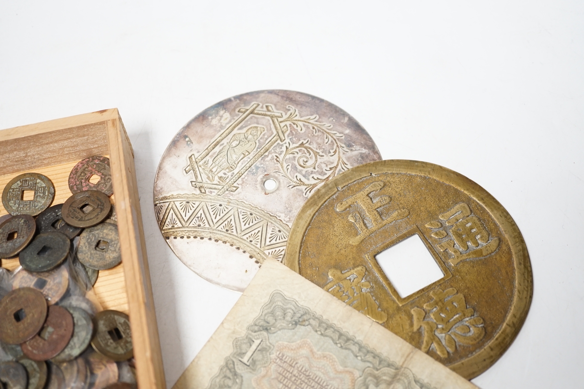 A group of Chinese tong bao cash coins, mostly Qianlong and Jiaqing and various World Bank notes including central bank of China 50 customs gold units and 20 customs gold unit